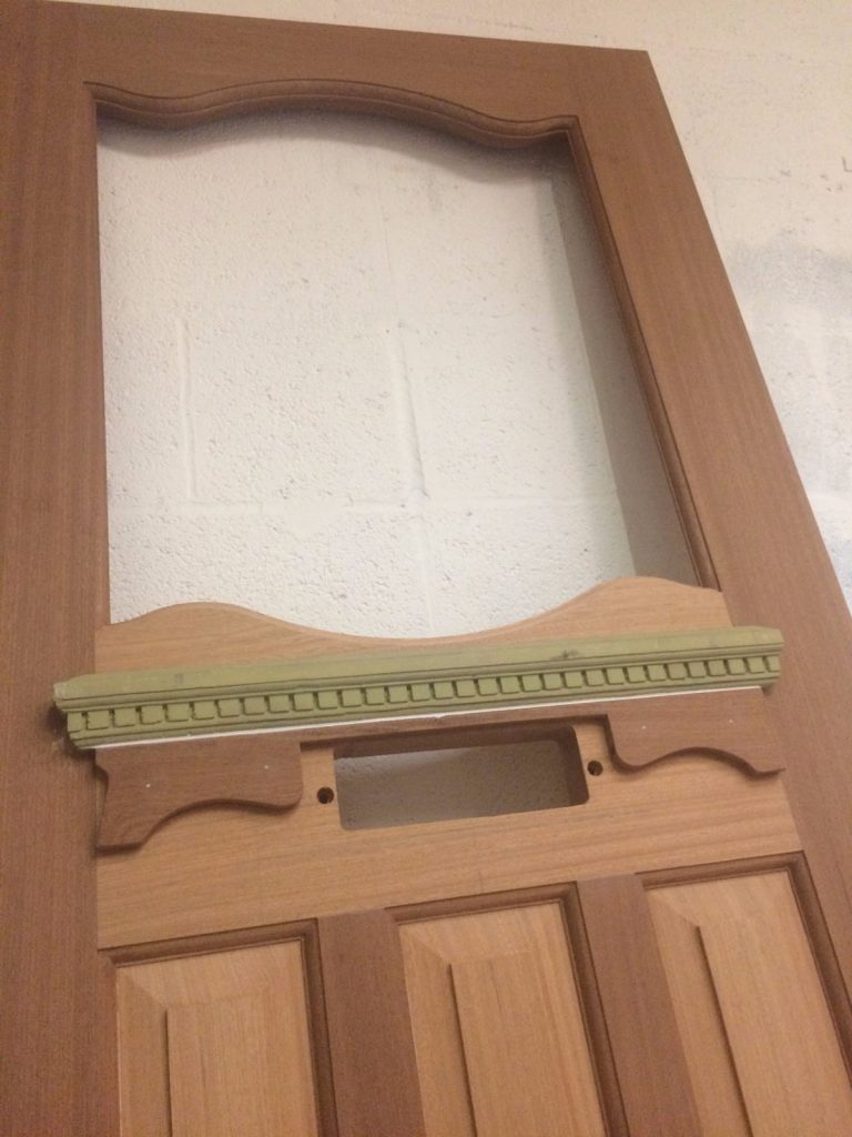 Decorative front door shelf