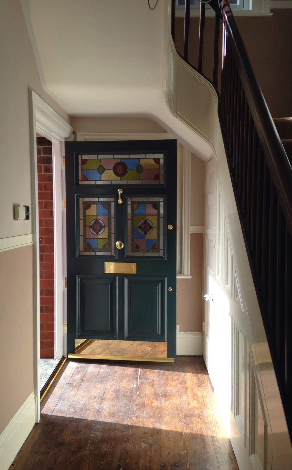 The same Georgian door painted, glazed and fitted