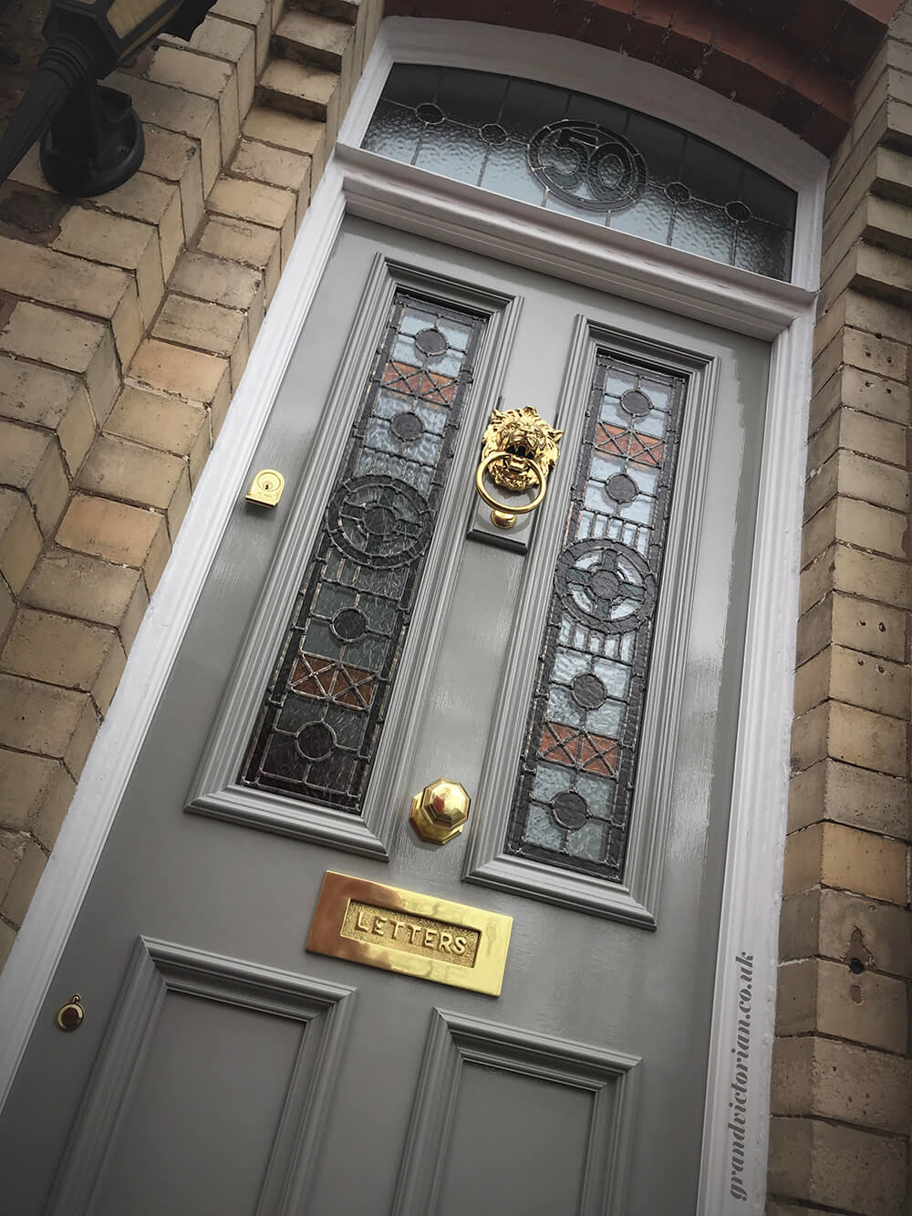 Victorian front door in Hale with original period leaded lights