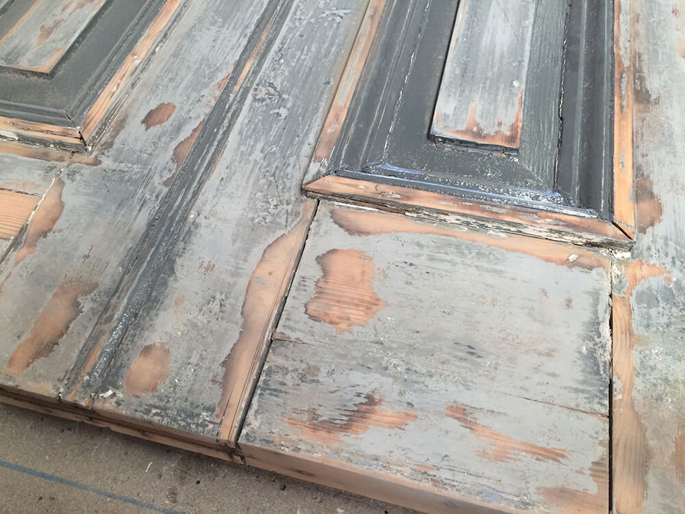 Stripping paint from the door